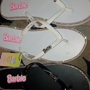 Both pairs of flip flops limited edition collectors Barbie!!